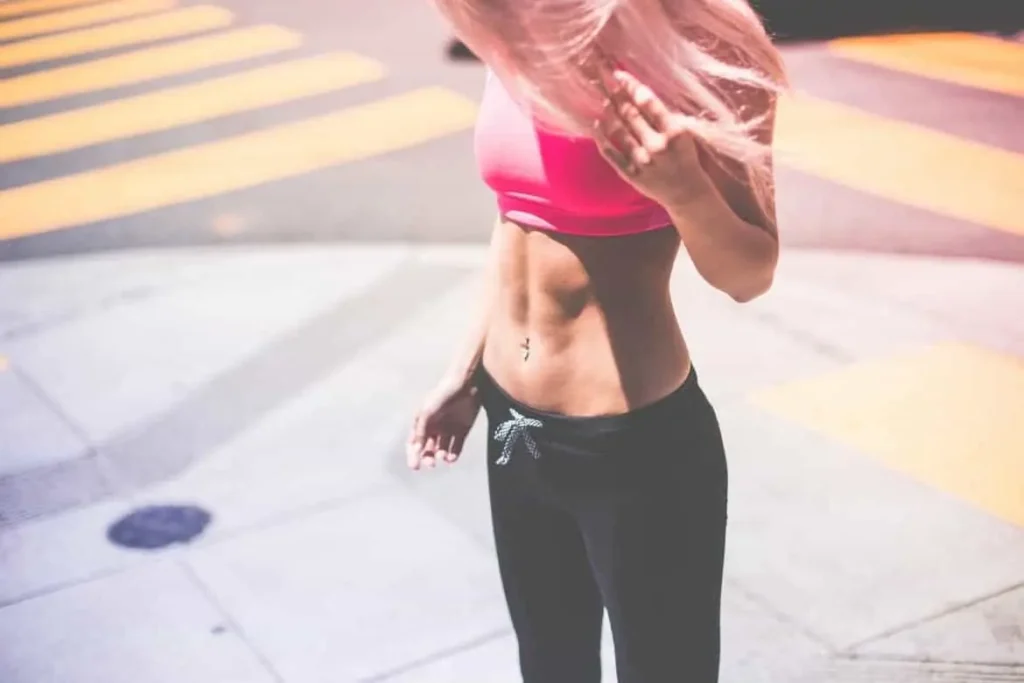 Woman with toned stomach after LA-EMS Body Sculpting Treatment Wantage
