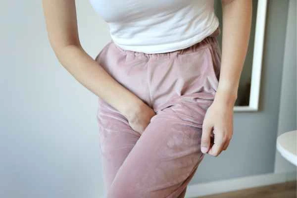 woman running for the toilet because of urinary incontinence Wantage